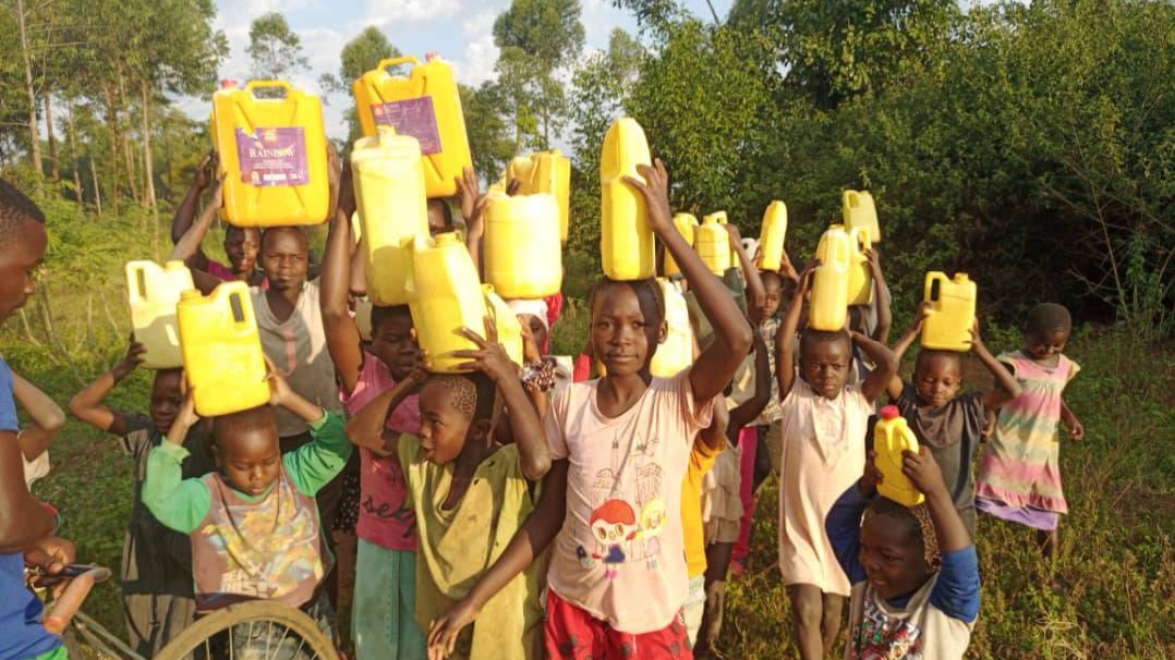 Water fetching / second activity at orphans of Uganda Children Center